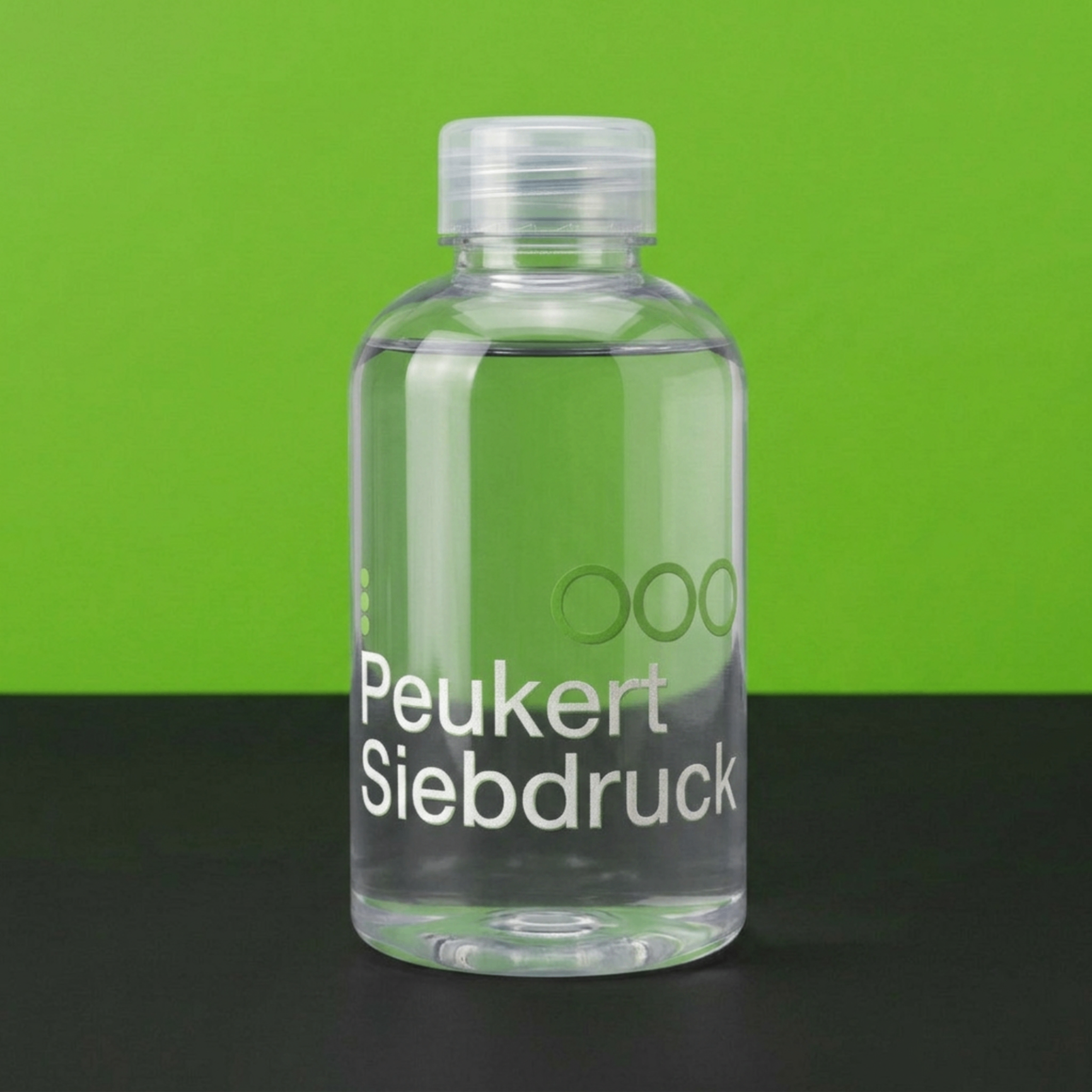 Transparente Kunststoffflasche mit Peukert-Siebdruck-Aufdruck